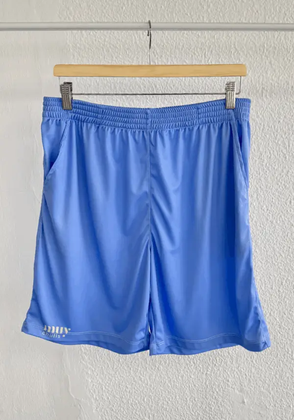 Pantalón corto con bolsillos de hombre